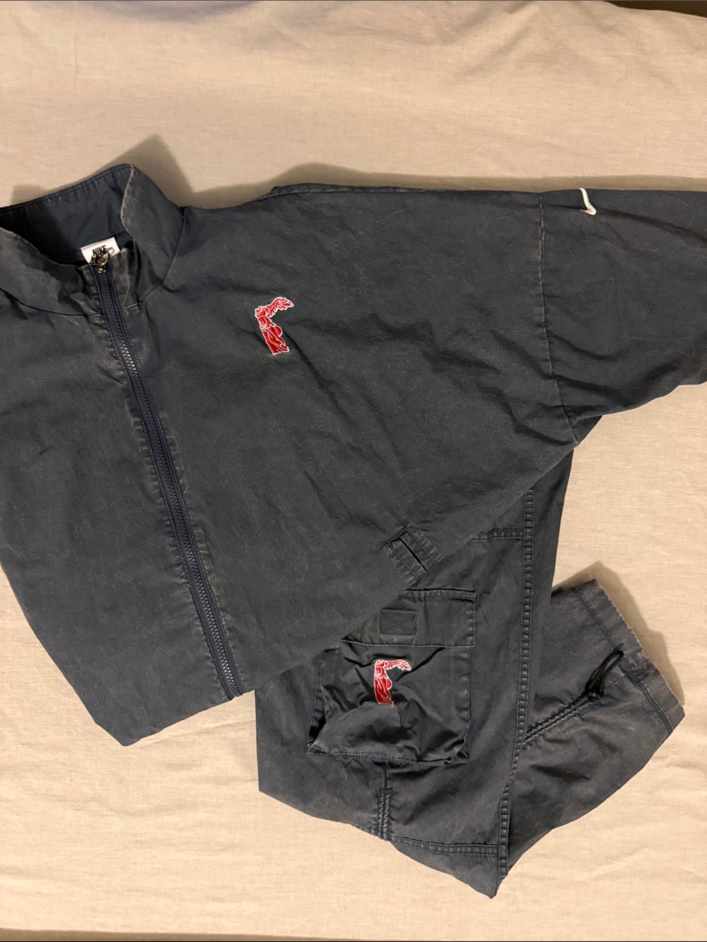 Nike Women’s blue wash tracksuit jacket and pant size Med